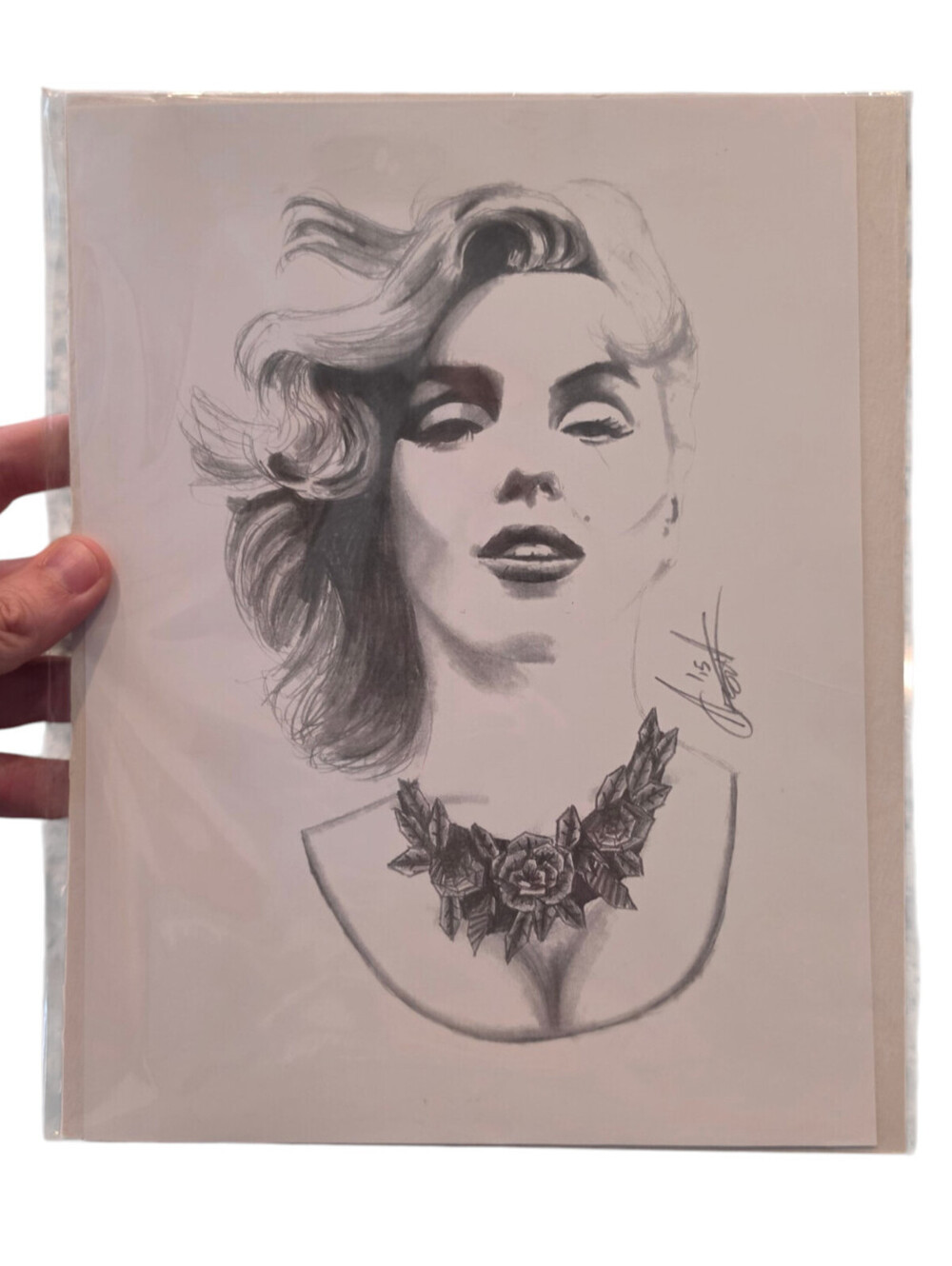 Vintage black-and-white graphite pencil portrait drawing of Marilyn Monroe